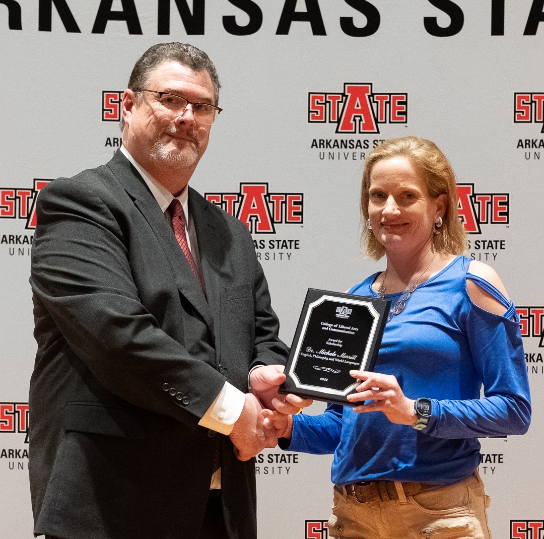 Michele Merritt receiving CLAC Award for Faculty Scholarship